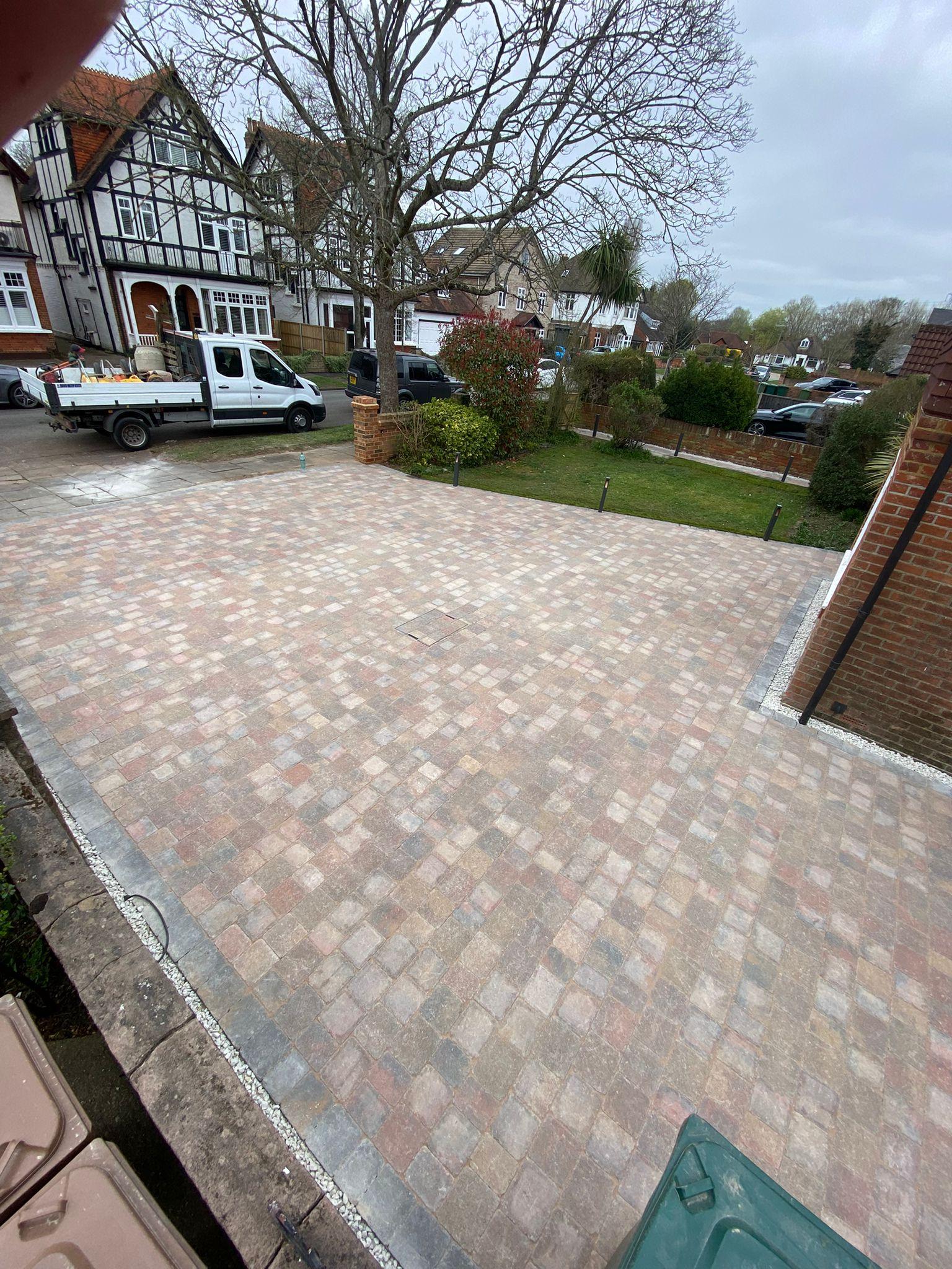 Large block paving driveway on residential street, Surrey