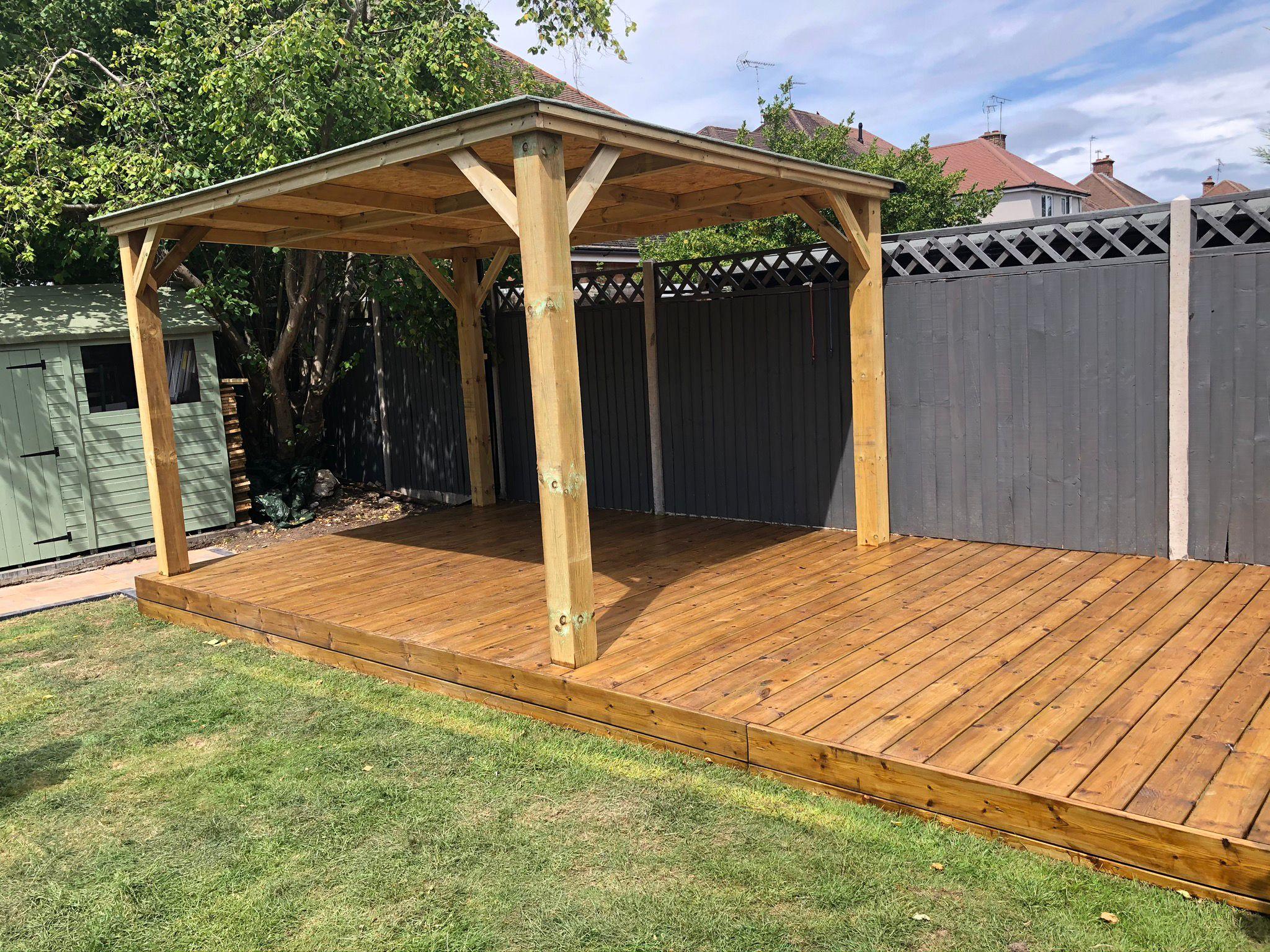 Timber gazebo with composite decking and close-board fencing, Surrey